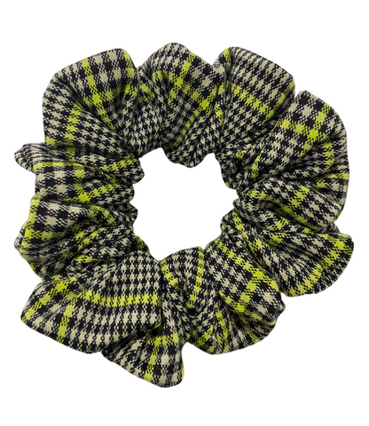 Plaid scrunchie with green and black pattern on a white background