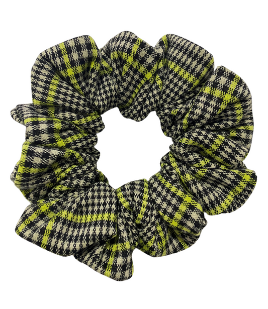 Plaid scrunchie with green and black pattern on a white background