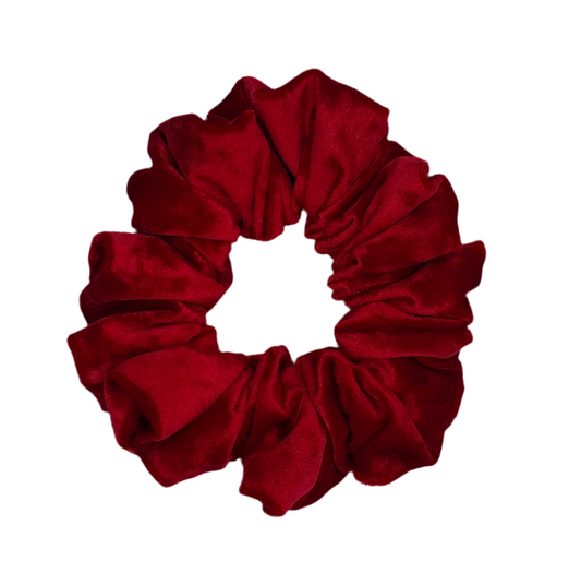 Red scrunchie on a white background