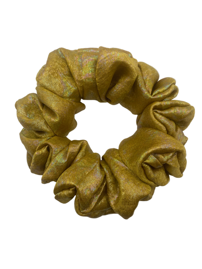 Gold scrunchie on a white background
